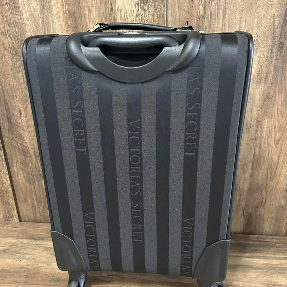 Victoria's Secret black striped suitcase and 4 pcs train case
